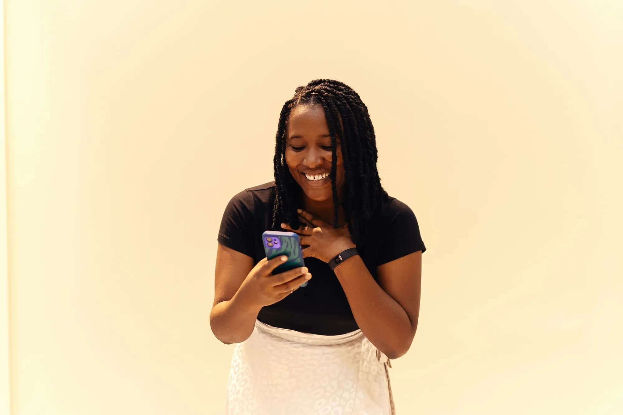 Creator checking her storefront on her phone